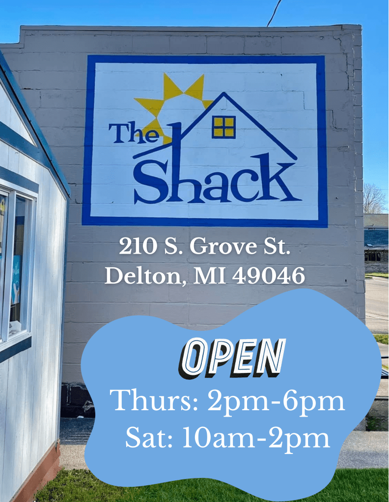 Photo of The Shack’s painted exterior wall featuring the logo, with overlaid text showing the address “210 S. Grove St., Delton, MI 49046” and open hours: Thursdays 2–6pm and Saturdays 10am–2pm.